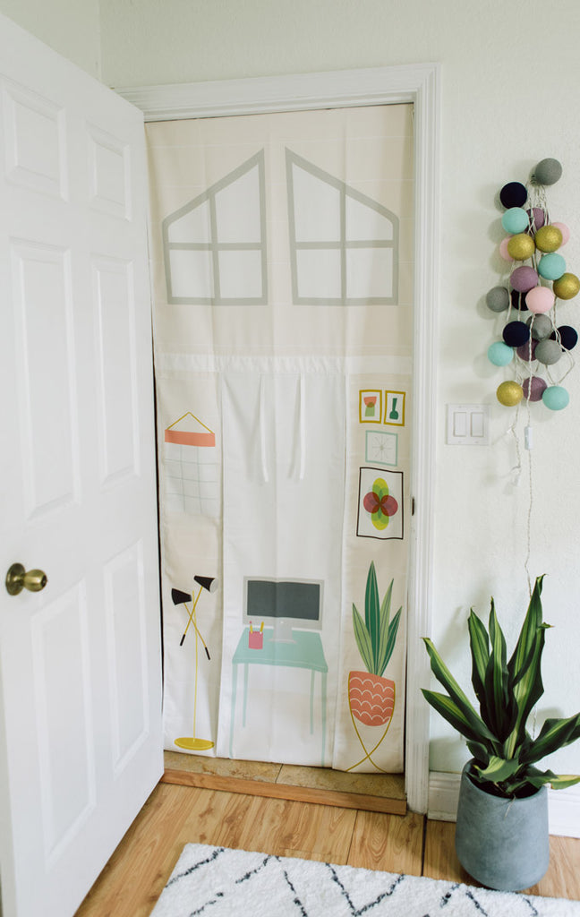 Hanging doorway playhouse kids toy illustrated with a pretend home office. Kids activity room design playroom ideas