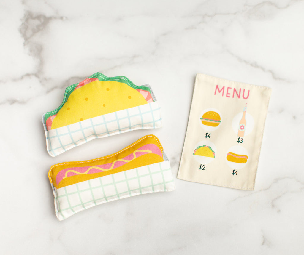 Pretend play taco, hot dog, and food menu made from fabric. Kids camp food truck toys. Top entrepreneurial toys for kids ideas 2022